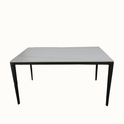 China Assemblable Modern Living Room Furniture White Rock Slab Dining Table With Black Metal Legs for sale