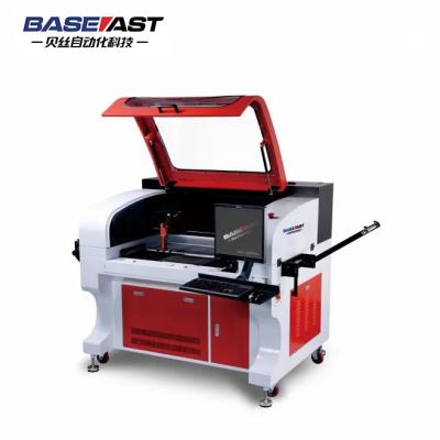 China Hot Selling Automated Loading Emb Patch Badge Laser Cutting Machine Automated Outline For Clothes for sale