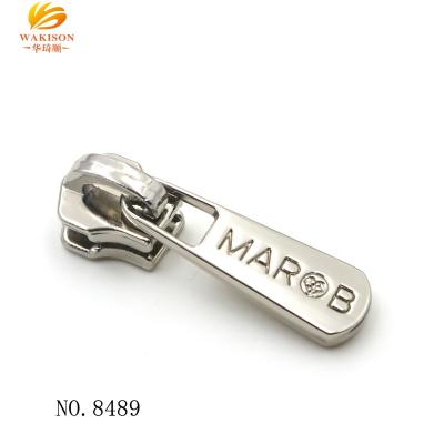 China Eco-Friendly / Duable Engraved Logo Style Zipper Puller For Wallet Accessories for sale