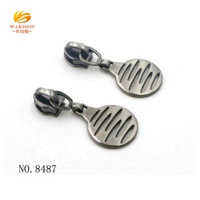 China New Reversible Zipper Puller Items Fancy Reversible Metal Zipper For Bags for sale