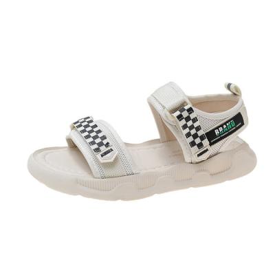 China Front And Back Hook And Loop Band Travel Sports Women Summer Shoes Sandal Sandals Black And White Summer Casual New Plaid Flat Sandals for sale