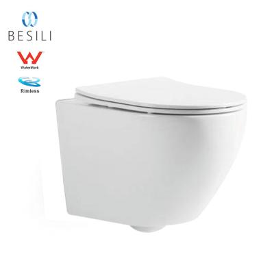 China New Designs Watermark Bathroom Cistern Wc Wall Hung Concealed Ceramic Toilet One Piece Rimless Mount Toilet for sale