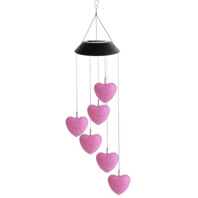 China Modern Outdoor Patio Hanging Heart Shape Solar Wind Chimes For Home Decoration for sale