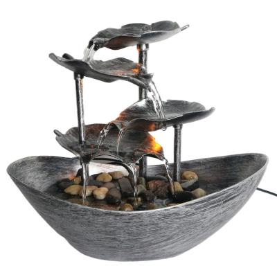 China Eclectic Home Decor Tabletop Fountain, Automatic Pump with Power Switch, Basin with Natural River Rocks and Reflective Lighting Feature for sale