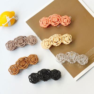 China Korean Headwear New Design Cute Transparent Acrylic Hair Jaw Keeps Pure Color Flower Shape Girls Matte Jumbo Claw For Thick for sale