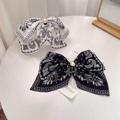 China New Headwear style hairpin pearl printing large bow hair accessories summer temperament clips for women women girls fashion fabric NC; NHS for sale