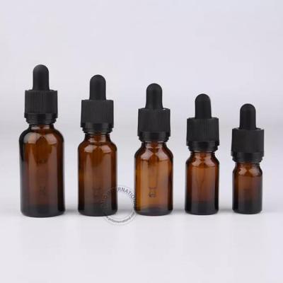 China Personal Care 5ml 10ml 15ml 20ml 30ml 50ml 100ml Amber Color Essential Oil Glass Bottle With Cap Child Safe Cosmetic Oil Dropper Glass Bottle for sale