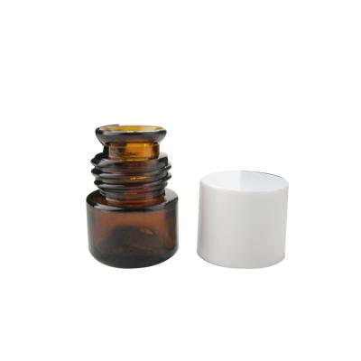 China Personal care 15ml empty 0.5oz Amber Glass Bell Mouth Bottle for perfume oil containers with plastic screw cap for sale