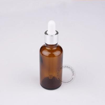 China Personal Care 50ml Essential Oil Amber Glass Dropper Bottles Silver Cap Essential Oil Glass Bottle With Gold And Silver Caps for sale