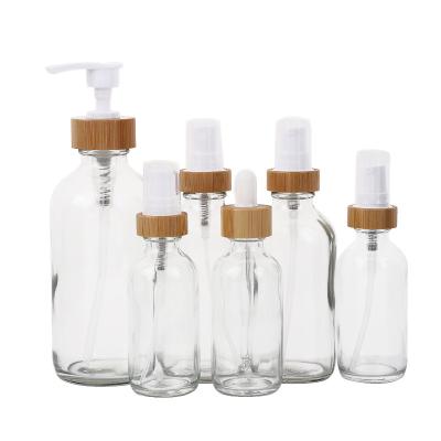 China 60ml 120ml 250ml Cosmetic Perfume Spray Bottle Lid Dropper Bottles Bamboo Glass Pump Bottle for sale