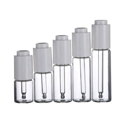 China 10ml 15ml 20ml 25ml 30ml Essential Oil Cosmetic Dropper Bottles Clear Glass Dropper Bottles With White Type Button Dropper Press Lid for sale