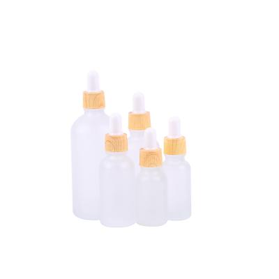 China Cosmetic Oil Bottle With Dropper Bottle Serum Essential Oil Glass Bottle Packaging for sale