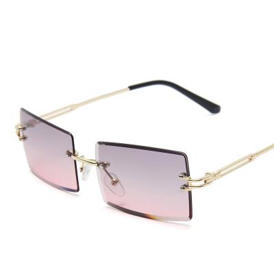 China Fashion Sunglasses Frameless Cut-Edge Sunglasses New Ladies Fit Gradient Color Sharp Red Sunglasses Trend Street Shooting Glasses for sale