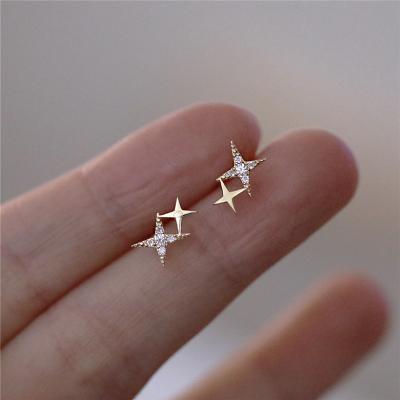 China 925 Sterling Silver Japanese Micro Inlaid Crystal Four-Pointed Star Plating 14k Gold Women's Banquet Jewelry Cute Small Star Stud Earrings for sale