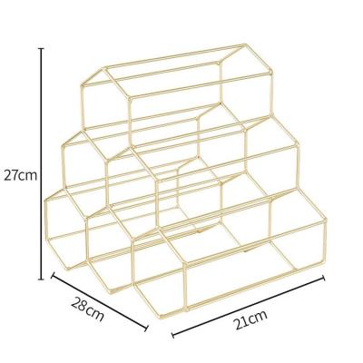 China Sleek Worktop Viable Rose Gold Metal Steel Champagne Stacked Honeycomb Wine Rack Shelf Storage Rack New for sale