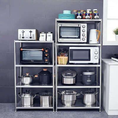 China Sustainable Multifunctional Microwave Storage Rack Stylish Oven Shelf Modern Kitchen Floor Stand for sale