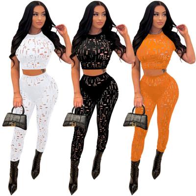 China Breathable high quality spring and summer women wear ripped solid color ladies tight sexy sports and leisure casual two piece sets for sale