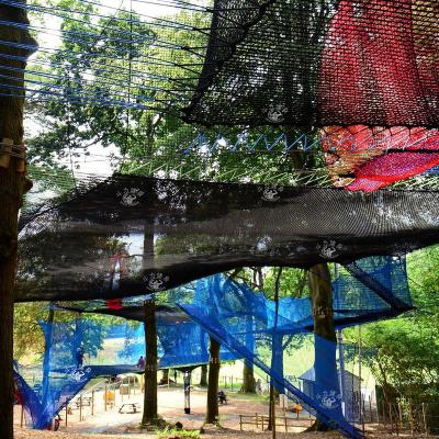 China Colorful Douli customizable popular children adults outdoor colored rope crocheted jungle treetop net adventure playground for sale