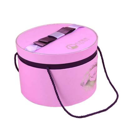 China Recycled Materials Wholesale High Quality Custom Pink Big Round Craft Gift Paper Box Make Up Brush Packaging With Handle for sale