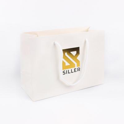 China Recyclable Wholesale Custom Golden White Card Shopping Paper Bag With Your Own Logo for sale