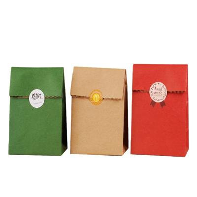 China Recycled Materials Spot Custom Logo Square Bottom Gift Wrapping Paper Bag Custom Thickened Retro Gift Wrapping Paper Bag for sale