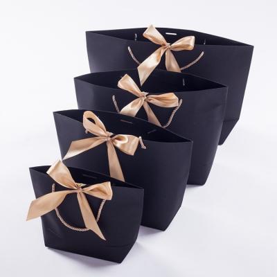 China Wholesale Materials Factory Recycled Butterfly Wedding Gift Paper Bag Gift Bag, With Logo for sale