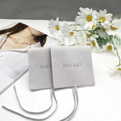 China Custom Suede Jewelry Pouch Luxury Packaging for Environmentally Friendly Bracelets for sale