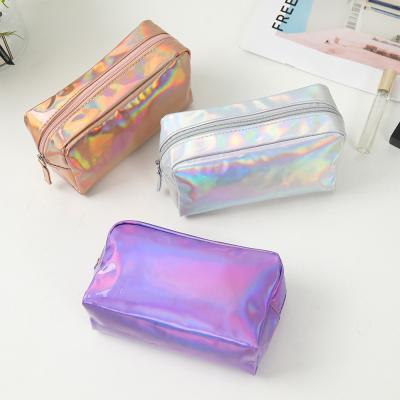 China PU Cosmetic Bag Custom Logo Holographic Silver Purple Waterproof Zipper Pouch Rose Gold Makeup Bag Fashion for sale