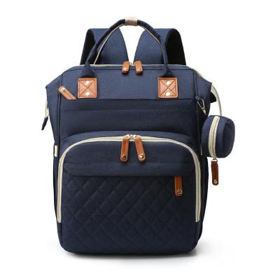 China Logotipo personalizado Mommy Baby Bag Mochila de pañales con cuna de viaje y estación de cambio en venta