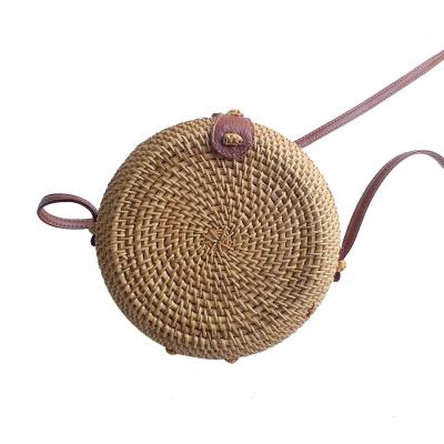 China Unisex Round Straw Beach Vintage Handmade Woven Circle Vacation Portable Shoulder Bag for sale