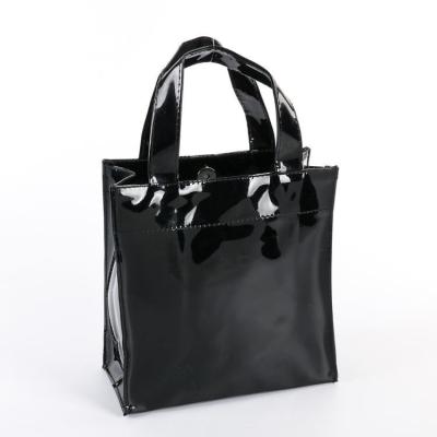 China Diseño de impresión de moda personalizado Gloss Mirror Tote Handle Bolsa de compras con logotipo Bolsa de PVC a prueba de agua en venta