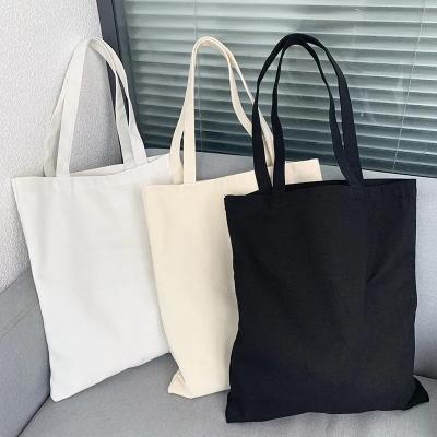 Chine 12 oz original sac à main en coton simple avec logo personnalisé sac à main écologique à vendre