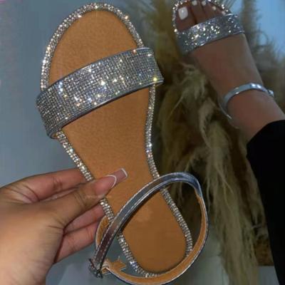 China Fashion Trend Round Toe Rhinestone Flat Buckle Strap Open Sandals Women's Outdoor Beach Slides Shoes Women Shoes for sale