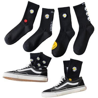 China Eco Frendly thongs embroidery daisy flower sock tube fashion OEM black cotton thongs women's elite crew custom socks for sale