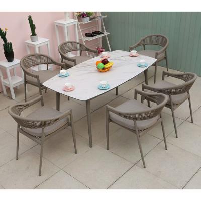 China Low Price Modern Patio Furniture Dining Sets Outdoor Glass Dining Table And Chairs for sale