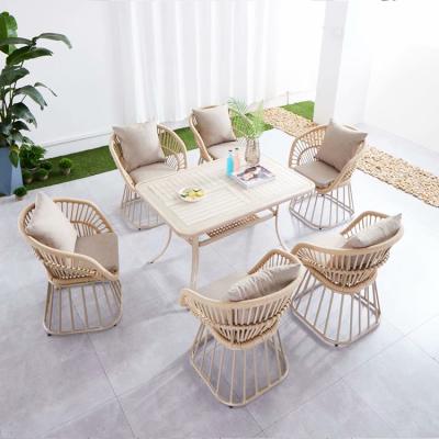 China Modern popular design outdoor furniture midcenturi armchair braided rope outdoor table chair set for sale