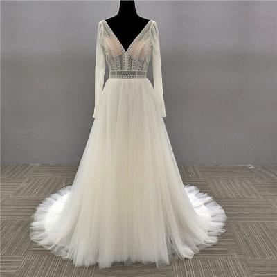 China Anti Static Long Sleeve Lace Up Bridal Gowns White Wedding Dresses With Sleeves for sale