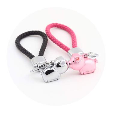 China Souvenir Gift Fashion Zinc Alloy Magnetic Cute Destiny Kiss Piggy Key Chain For Party Favors for sale