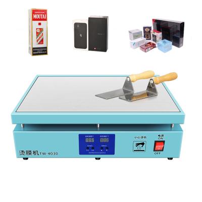 China Commercial Manual Hot Ironing Machine Food Ironing Machine Cigarette Gift Box Perfume Lipstick Mobile Phone Wine Wrapping Machine for sale