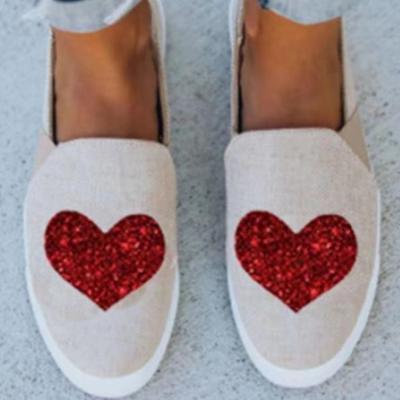 China Light Weight Couples Shoes Series Slip On Canvas Shoes With Heart Shapes for sale