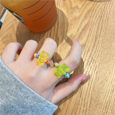 China OUYE Ring Handmade Rice Beads Female soft elastic index finger candy temperament transparent color bear CLASSIC Ring Female for sale