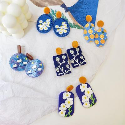 China CLASSIC Small Blue Daisy Flower Female OUYE Design Summer Design Summer Earrings Acrylic Color Mismatch Printed Dish Earrings For Women for sale