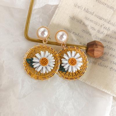 China OUYE S925 Handwoven Needle Sunflower Flower Alloy Earrings CLASSIC Silver Female Cool Round Girl Earrings Bead Daisy Earrings for sale