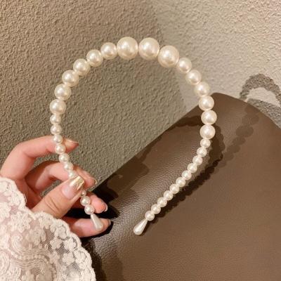 China Newest OUYE Retro Pearl Alloy Headband Temperament All-match Fashionable Hot-selling Female Cute Headwear for sale