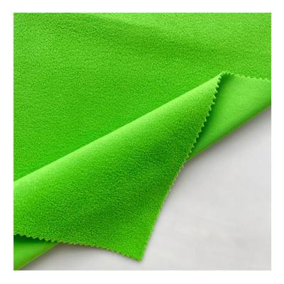 China Eco-freindly Sustainable Multicolor Optional Brushed 100% Polyester Velvet Fleece Fabric For Garment for sale