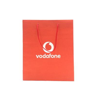 China Recyclable Hot Red Coated Paper Bag Shopping Bag With Handle Gift Paper Bag for sale