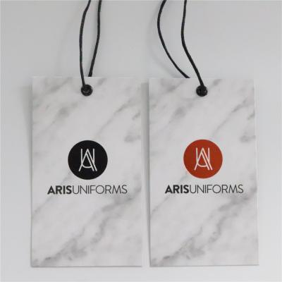 China Viable Custom Garment Swing Tag Cardboard Craft Art Paper Printing Logo String Hang Tags For Apparel Swing Tag for sale