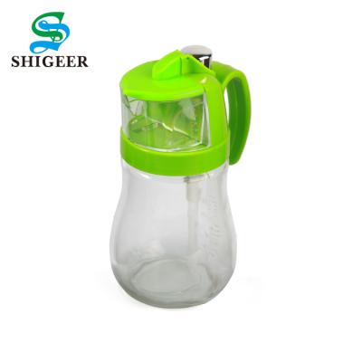 China China Manufacturer Customized Logo Kitchen Use Small Size 600ML Sustainable Glass Oil Jar With Handle for sale