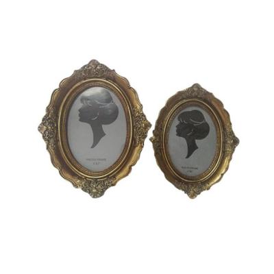 China 21123 Retro Vintage Resin Living Room Decoration Photo Frame Wall Hanging Oval Picture Frame for sale