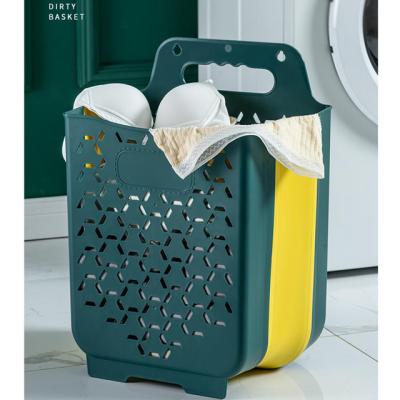 China 21207 Minimalist Plastic Folding Wall Hanging Pierced Laundry Basket For Bathroom for sale